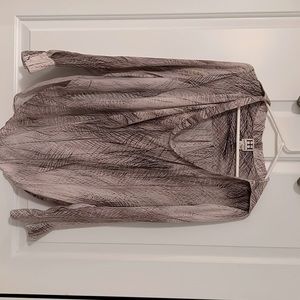 100% Silk, pale pink undertones, beautiful loose fitting blouse